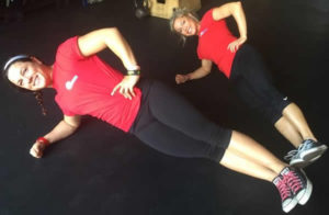 Magen and Leslie in side plank